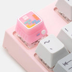Artisan Keycaps Tetris rose sur un clavier mécanique