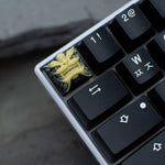 artisan keycaps chinese style dragon jaune et noir sur un clavier mécanique