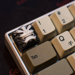 artisan keycaps chinese style dragon blanc et noir sur un clavier mécanique