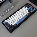 kit de keycaps snow sur un clavier mécanique