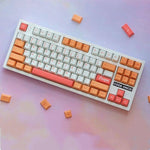 clavier mécanique avec des keycaps peach